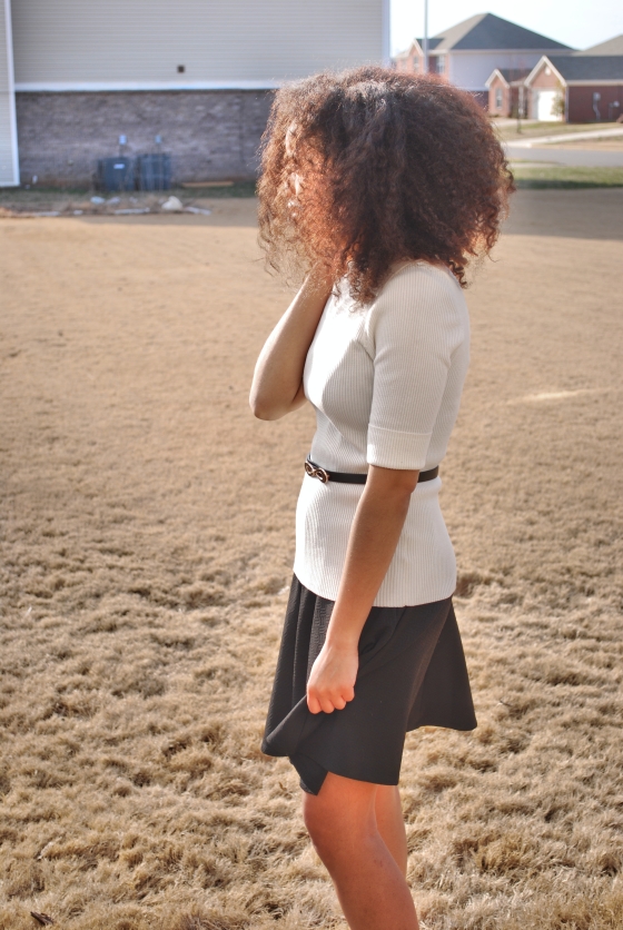 white sweater with black skirt